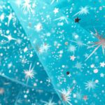 Turquoise Star Bursts Organza Fabric