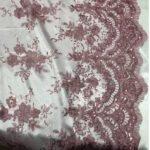 Mauve Embroidered Lace fabric